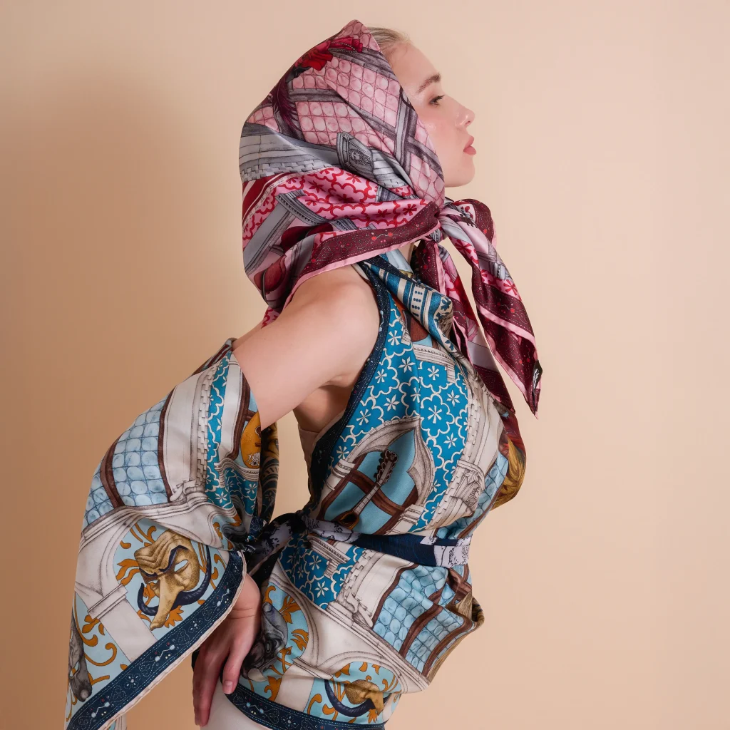 Model wearing Ilona Tambor silk scarf styled as headscarf, luxury silk scarves UK