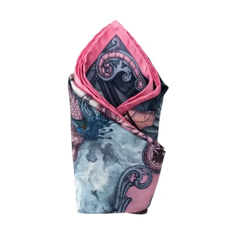 Silk pocket square Lago di Como Pink folded into a suit pocket.