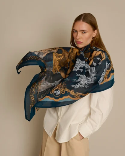 Woman wearing navy blue cotton silk scarf inspired by Lake Como, Ilona Tambor