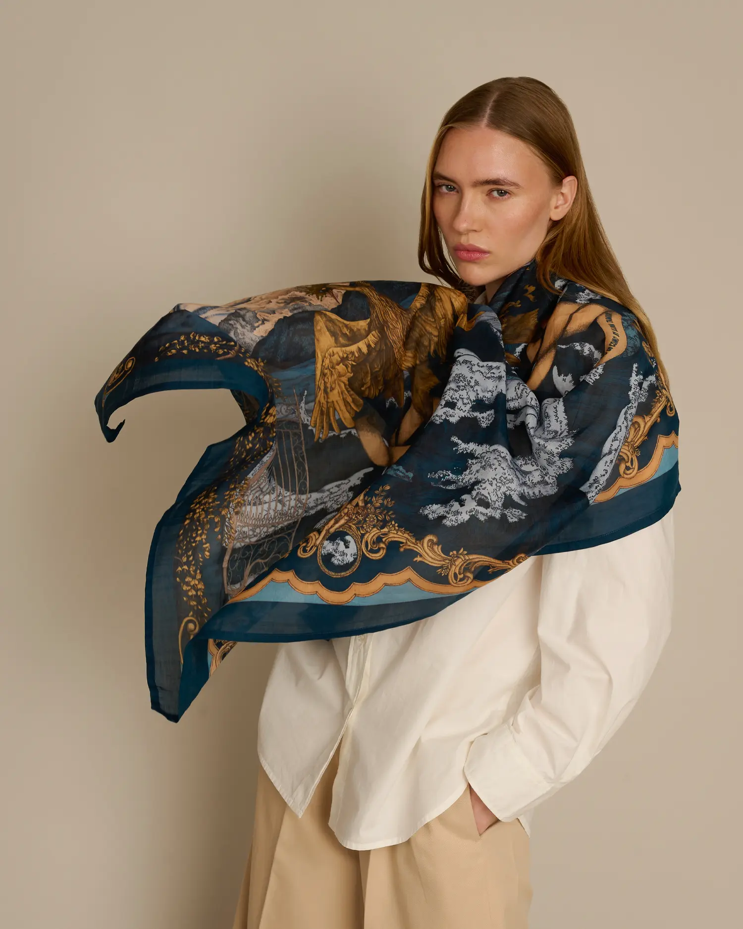 Woman wearing navy blue cotton silk scarf inspired by Lake Como, Ilona Tambor